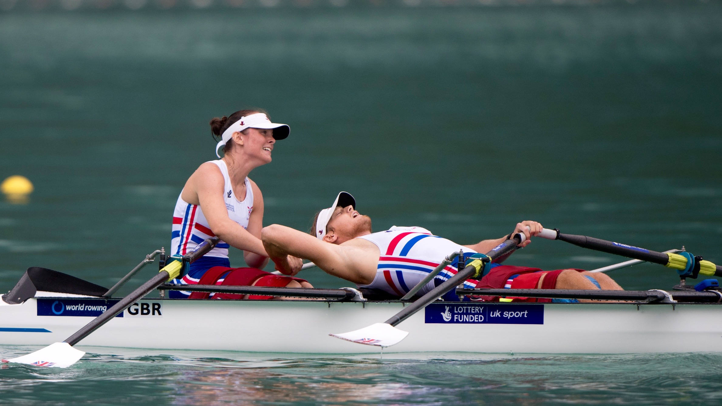 Lauren Rowles and Laurence Whiteley celebrate after winning silver at the 2015 World Championships in Aiguebelette