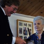 Dame Di Ellis presents Greg Gregory-Jones with his Medal of Honour