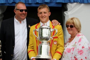 John Collins with his mum and dad