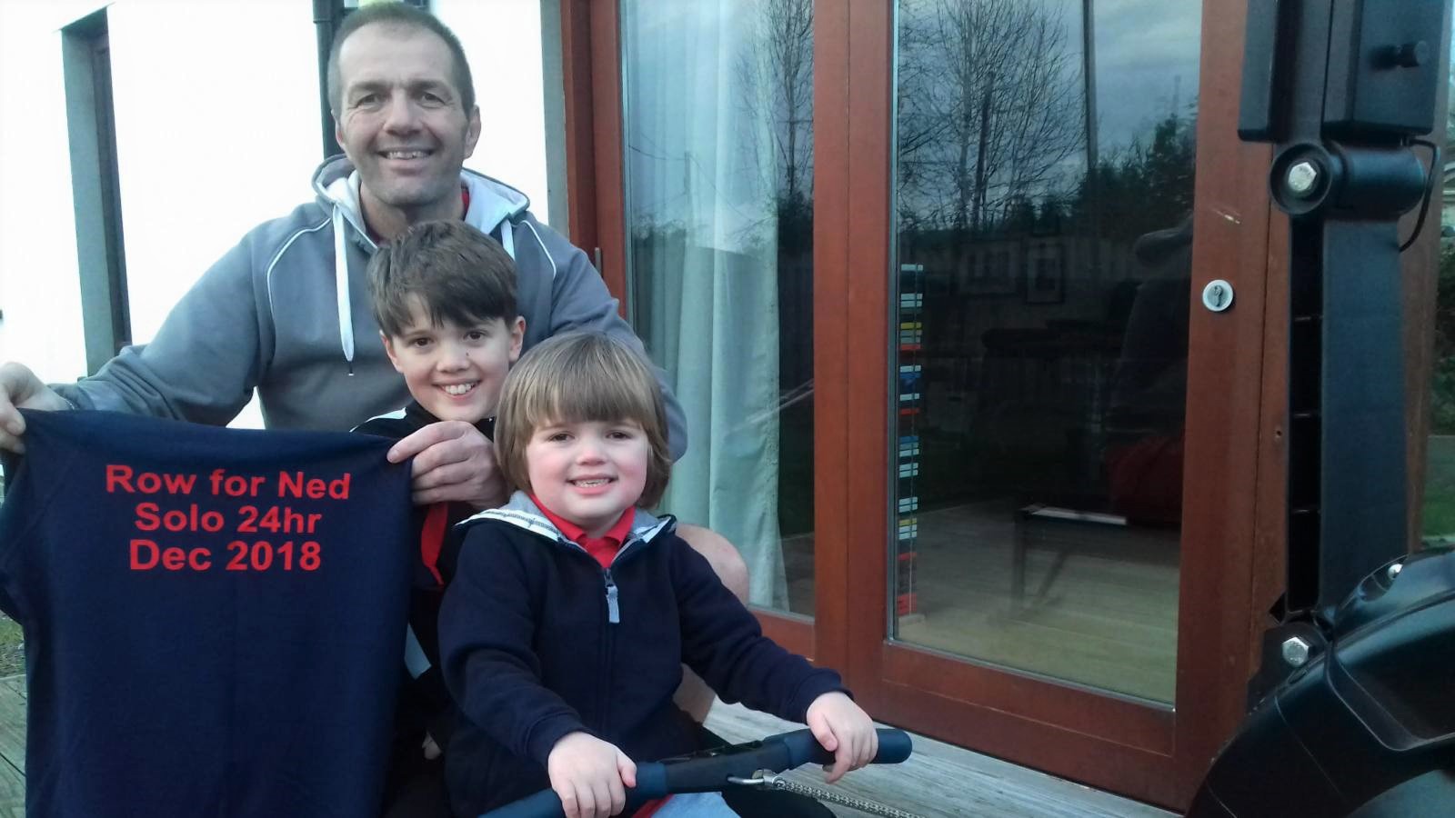 Bleddyn Jones and his two sons rowing for Ned