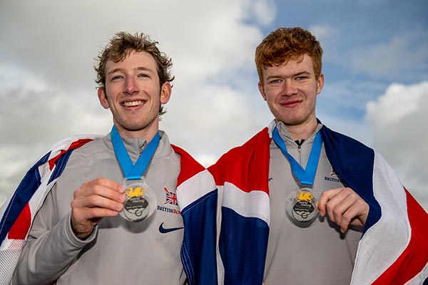 2 young men with medals