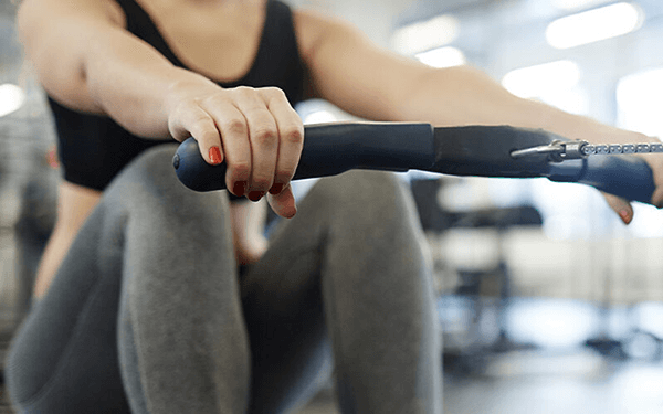 woman on rowing machine