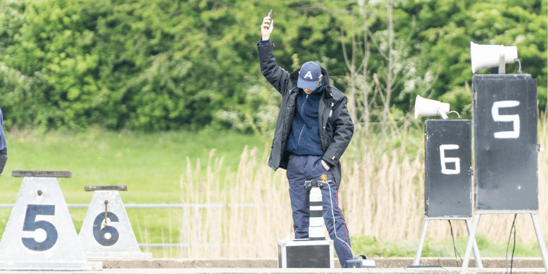 photographer at rowing regatta