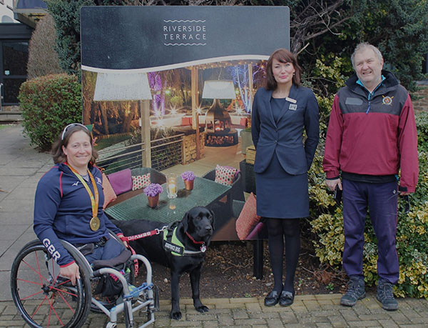 Paralympic rower with hotel manager and SuABC member