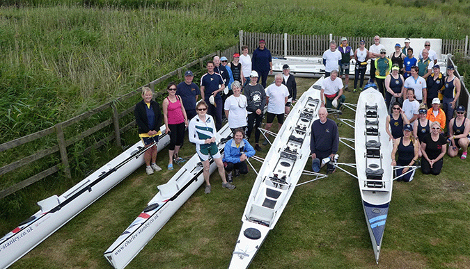 recreational rowers on a tour of the Norfolk broads