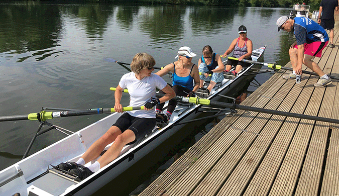 recreational rowers in sweep four