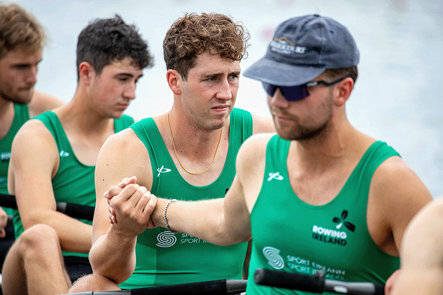 Irish rowers clasp hands before the start