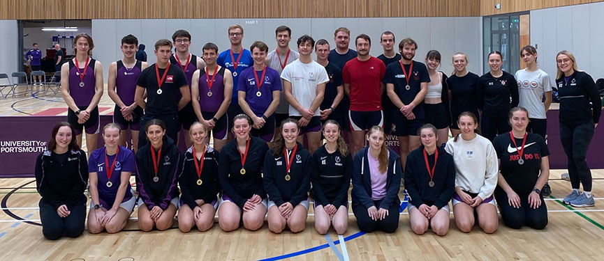 Students with medals in gym