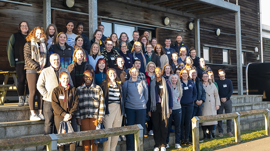 rowing coaches at the national training centre posing for a photograph