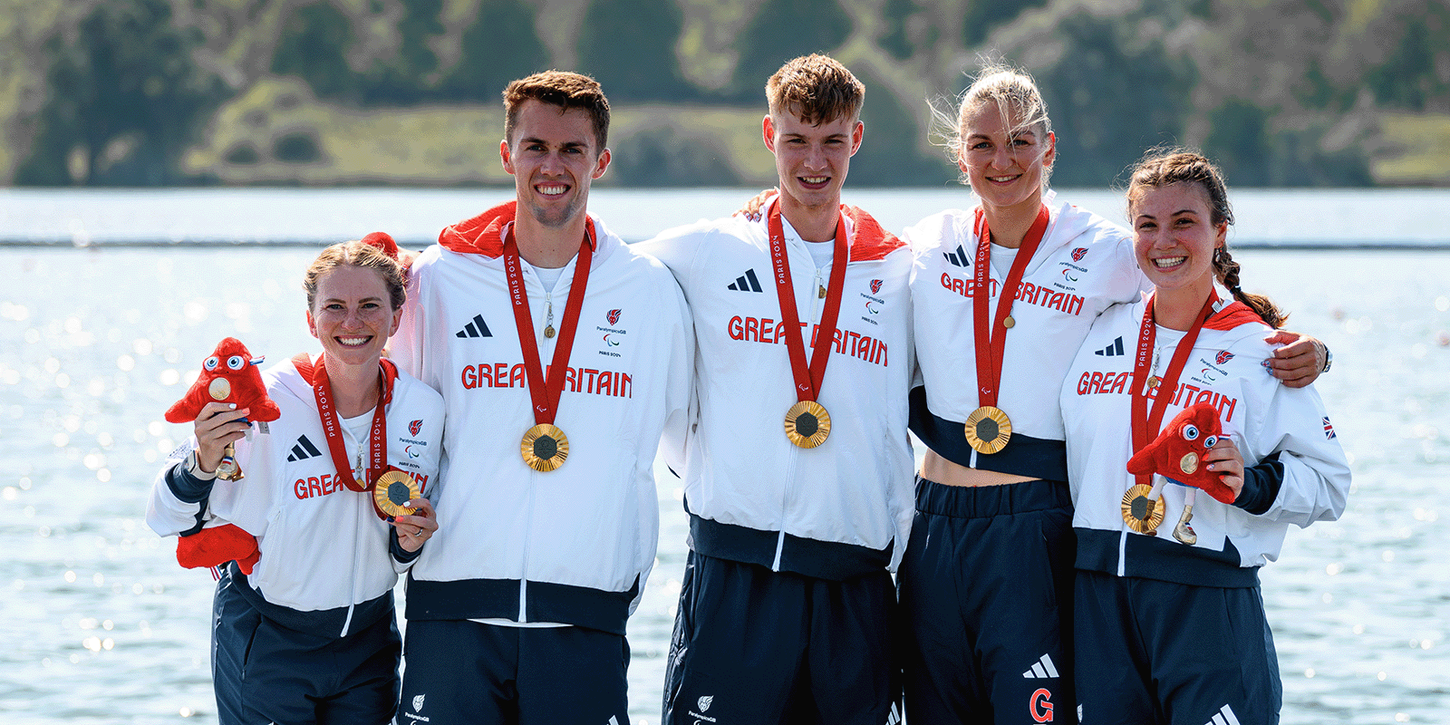 Crew with Paralympic gold medals