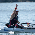 PR1 men's 1x with hand in air