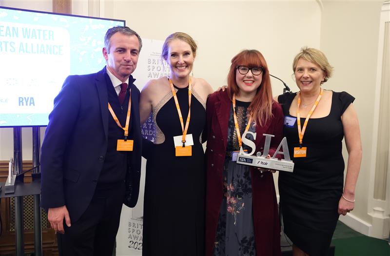 representatives of the Clean Water Sports Alliance accept Sports Journalist Association award