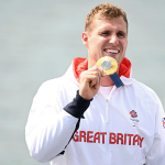 Man with Olympic gold medal