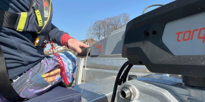 electric outboard motor on coaching launch