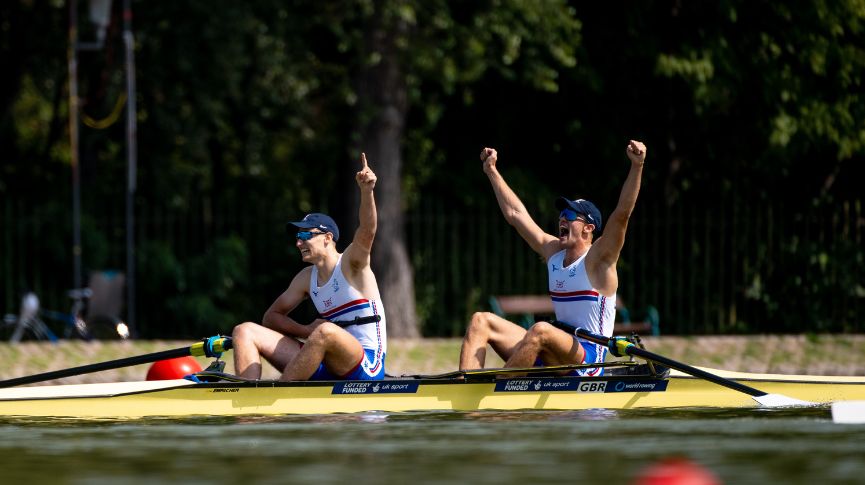 rowing pair cross line celebrate world championships