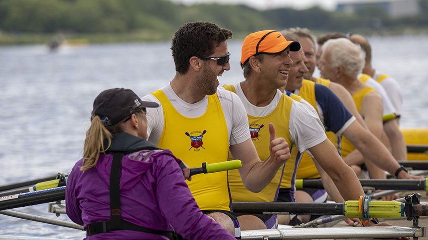 Happy rowers win race