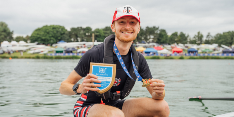 rower with medal and plaque
