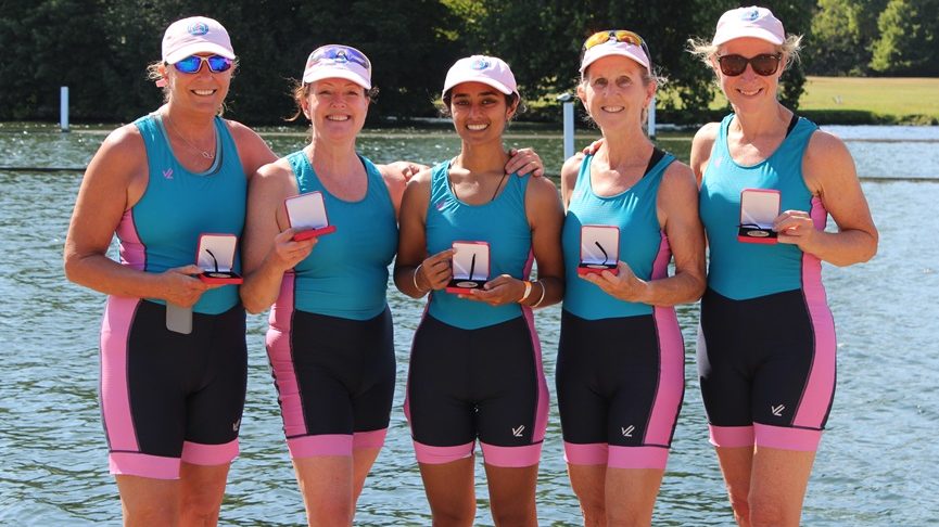 Women's crew with medals